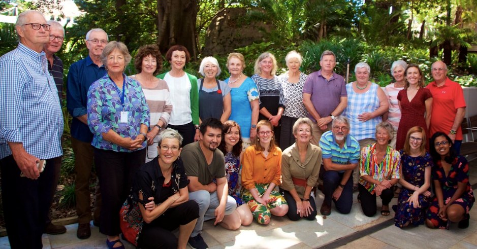 A group of people posing for a photo Description automatically generated