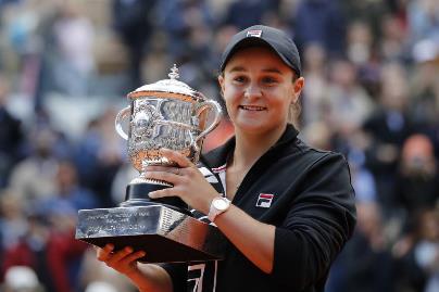Australia's Ashleigh Barty holds the trophy as she celebrates winning her women's final match of the French Open. Picture: AP